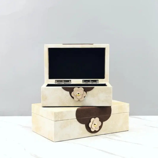 Handmade floral cream and brown leather jewelry box with textured leather and gold-toned centers for home decor by decorbites