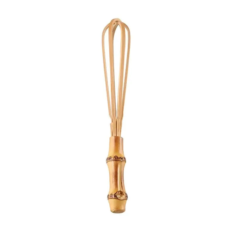 Handmade golden bamboo egg beater with decorative segmented handle and thin wire loops for flour mixer use
