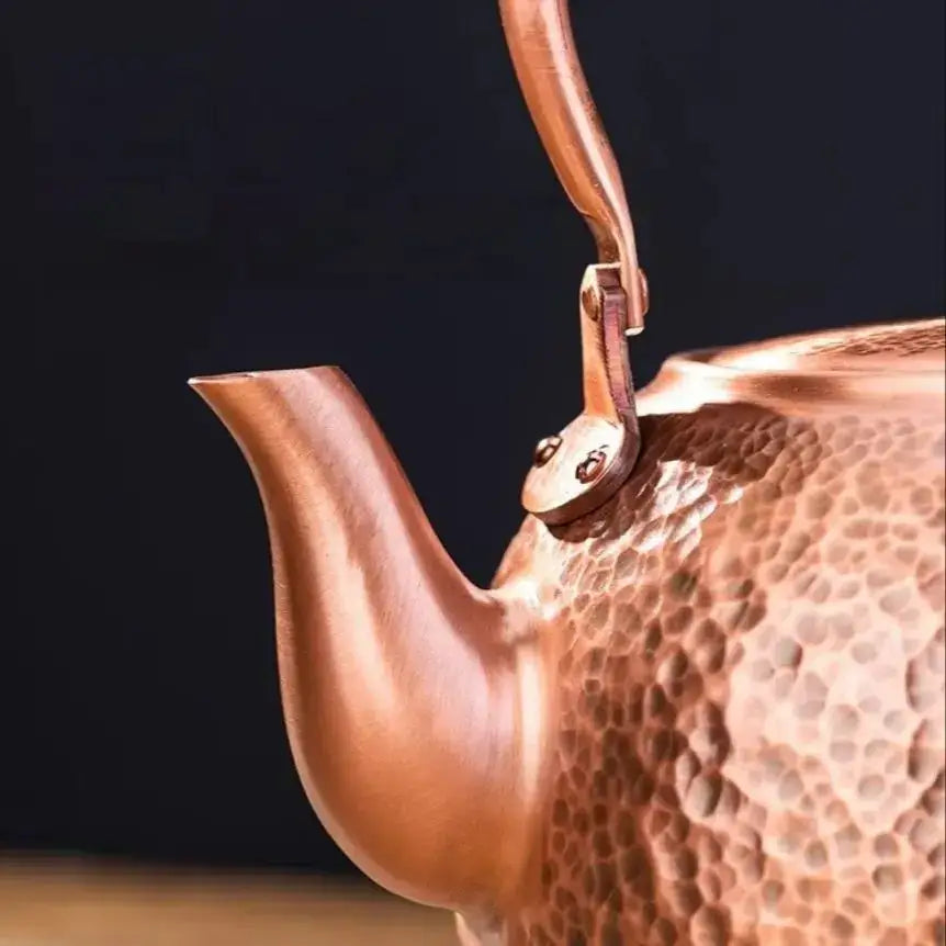 Handmade hammered copper tea pot with knitting handle decorbites handmade copper and curved spout for elegant serving