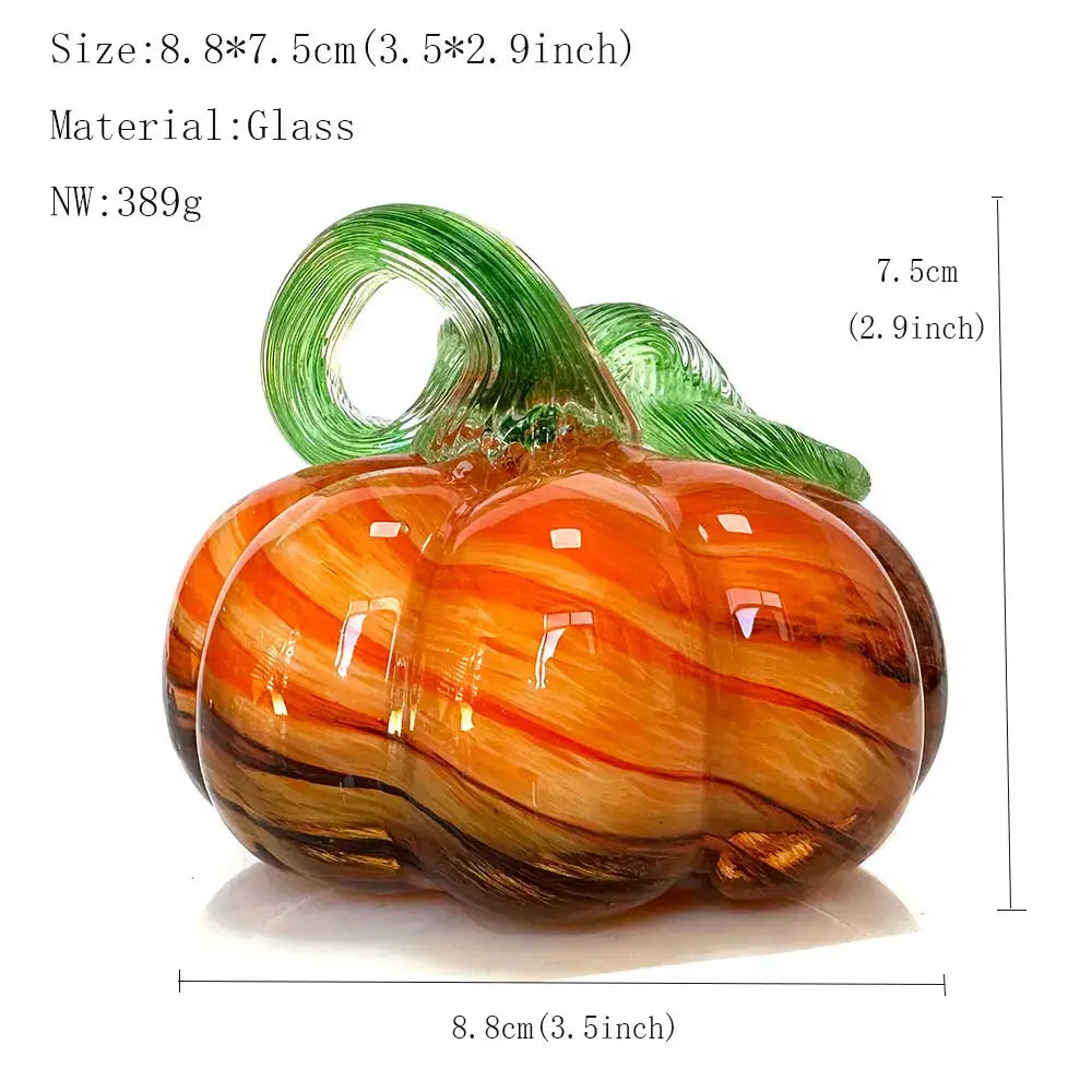 Handmade translucent orange and brown glass pumpkin figurine with green stem and swirling patterns for living room decor