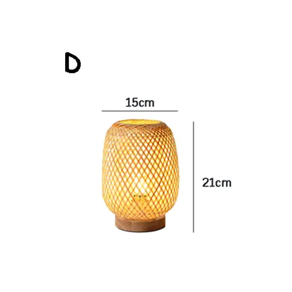 A warm glowing bamboo table lamp with a woven lattice design and wooden base for bedroom use