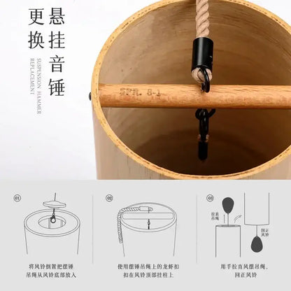 The replacement suspension hammer for handmade natural tan bamboo chord wind chimes features a black metal clamp and thick rope