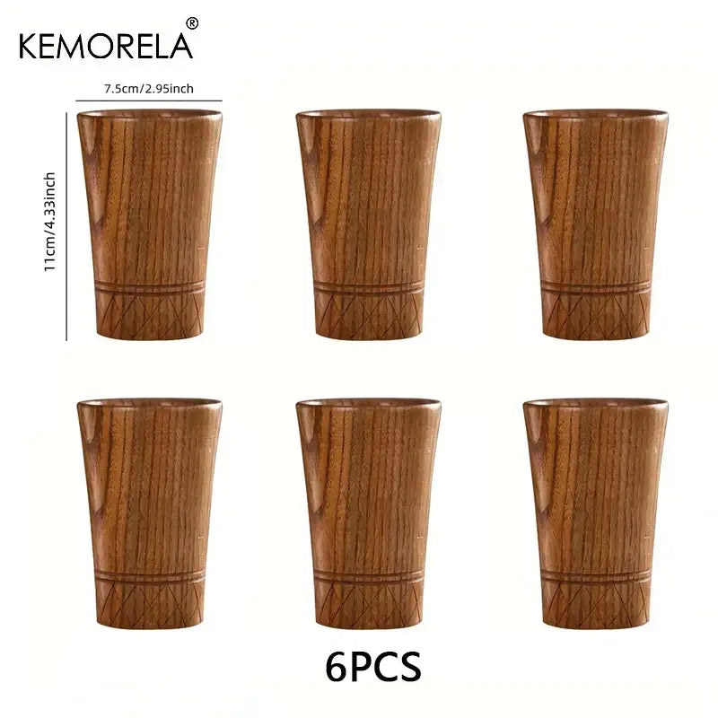 Set of six decorbites handmade natural wooden tea cups with warm brown finish and engraved geometric patterns near base
