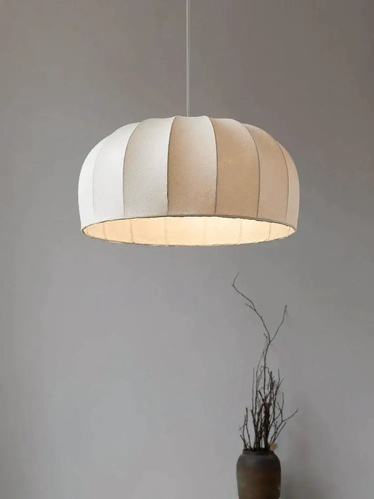 A soft dome-shaped silk pendant light with off-white and beige vertical stripes for dining room pendant lights