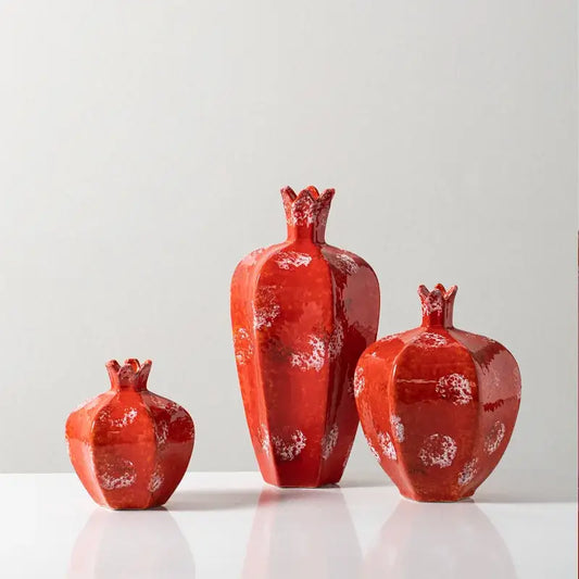 Three glossy red handmade pomegranate ceramic vases with white speckled accents for living room decorbites decor