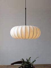 A decorbites handmade silk pumpkin pendant light with off-white fabric shade and black rod for dining room decor