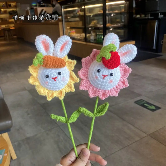 Two handmade sunflower bouquet crochet bunny ornaments with yellow sunflower and pink rose heads for bedroom decor