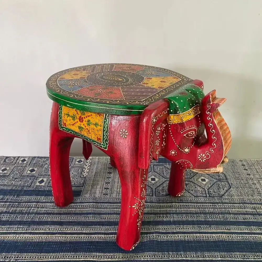 Handmade thai style vibrant red wooden decorbites elephant stool with intricate gold and green patterns for living room decor