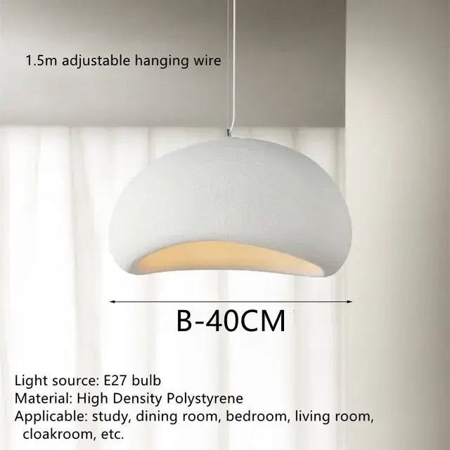 White dome-shaped handmade wabi sabi chandelier pendant light with textured surface and warm glow for dining room decorbites