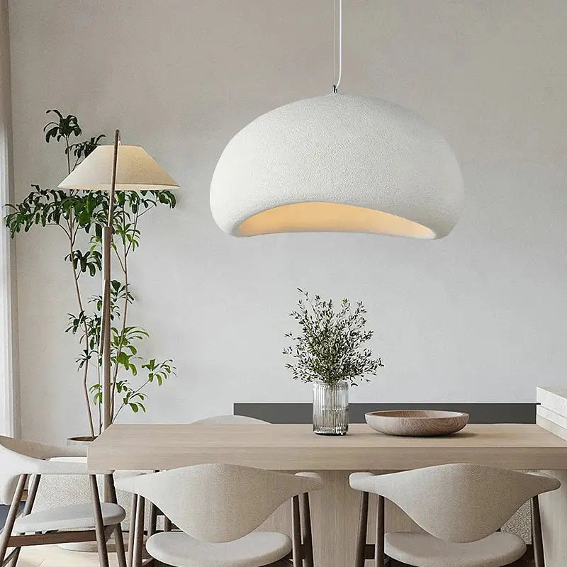 Handmade wabi sabi off white pendant lamp with textured curved dome and warm interior glow for dining room lighting decorbites handmade wabi