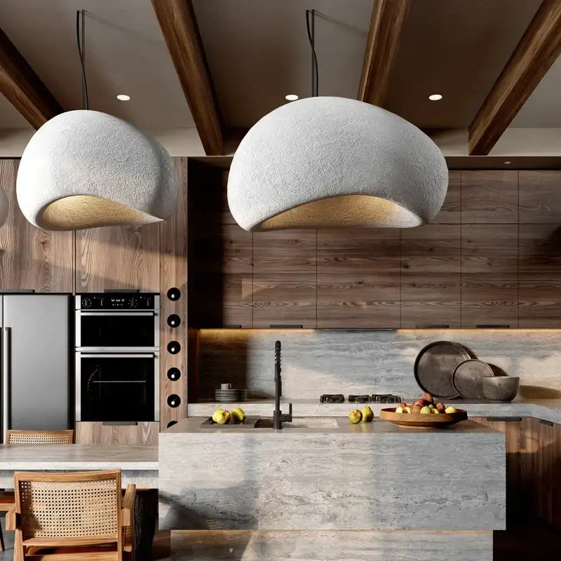 Two textured light gray dome-shaped decorbites handmade wabi sabi pendant lamps for dining room lighting are hanging