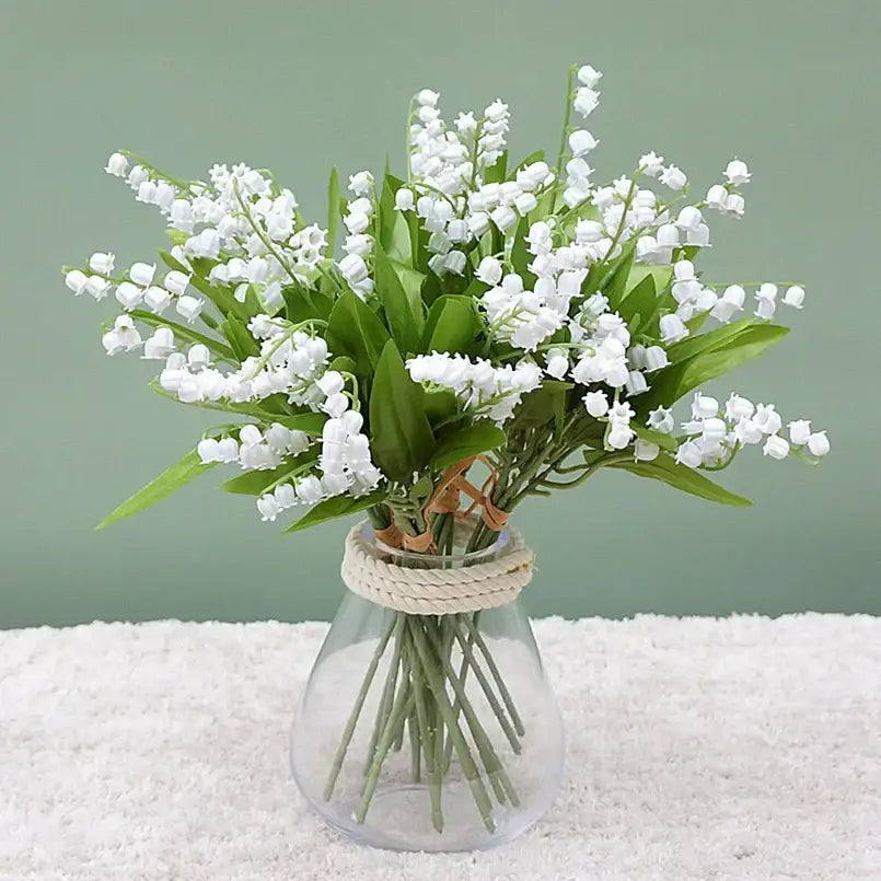 A clear glass vase with rope neck holds white bellflower artificial flowers decorbites bellflower artificial bouquet