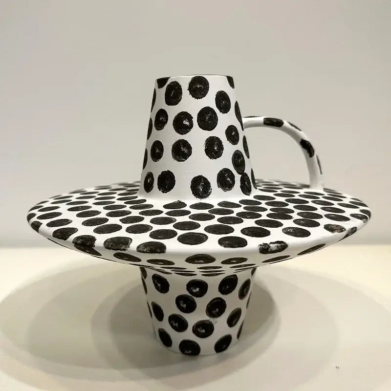 White ceramic mug with black white dots and handle wide flat base from decorbites black white kitchen set