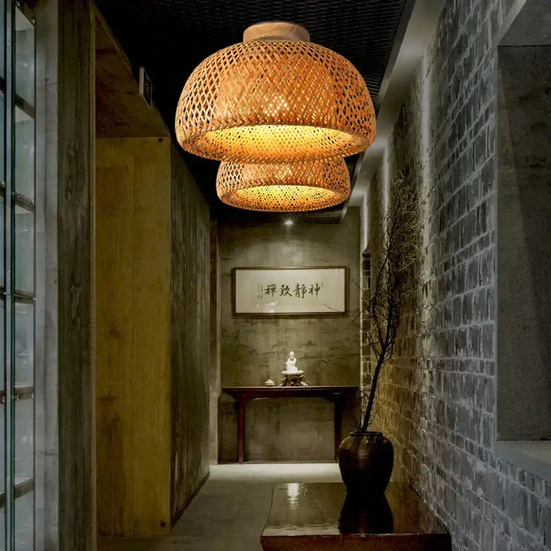 Handwoven warm-toned bamboo birdcage ceiling light with layered basket design for dining room decorbites bamboo birdcage