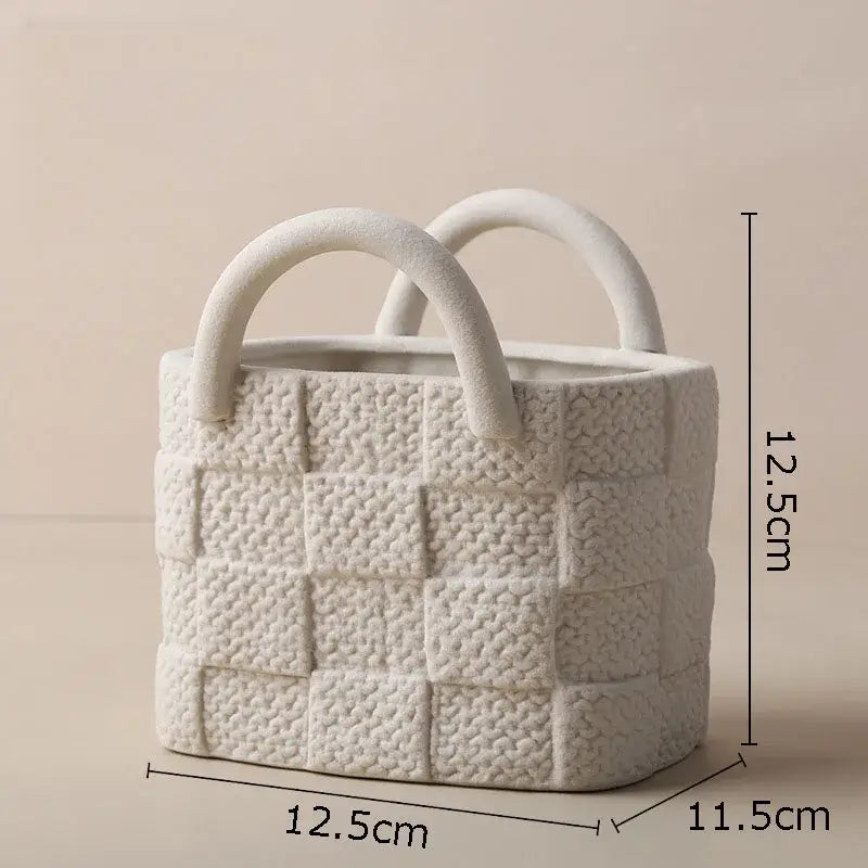 White ceramic decorbites handwoven ceramic basket planter with woven texture and curved handles for living room decor