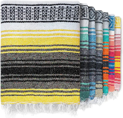 A decorbites handwoven mexican blanket with vibrant yellow black gray and white stripes and fringed edges for decor