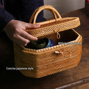 Handwoven rattan storage box tea caddy with woven handle and button closure for kitchen decorbites handwoven rattan decor