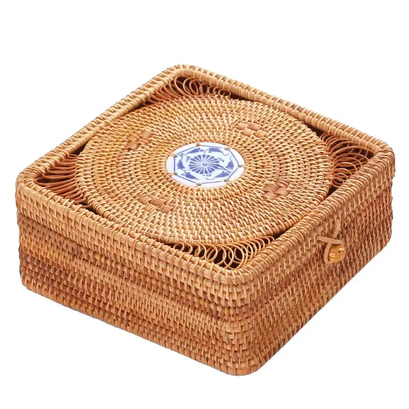 Handwoven rattan storage box with a natural woven body and blue and white ceramic lid by decorbites for kitchen use