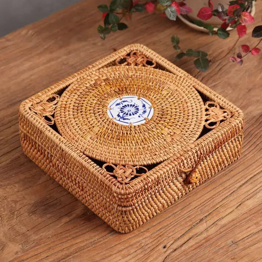Handwoven rattan storage box by decorbites with a blue and white ceramic floral lid for kitchen use and decor