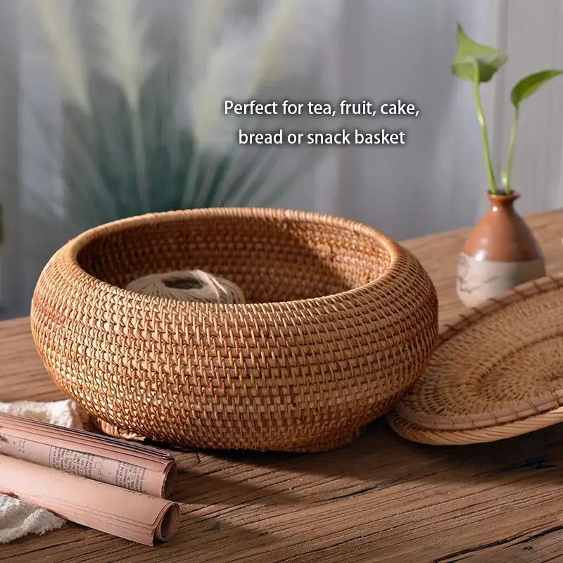 A round natural tan decorbites handwoven rattan storage box with lid and tight woven pattern for kitchen decor
