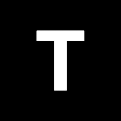 A bold white capital letter t on black background representing decorbites heart cake mold for kitchen baking