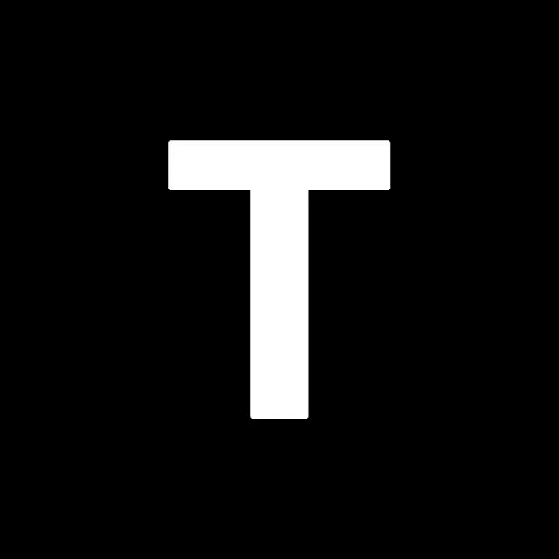 A bold white capital letter t on black background representing decorbites heart cake mold for kitchen baking