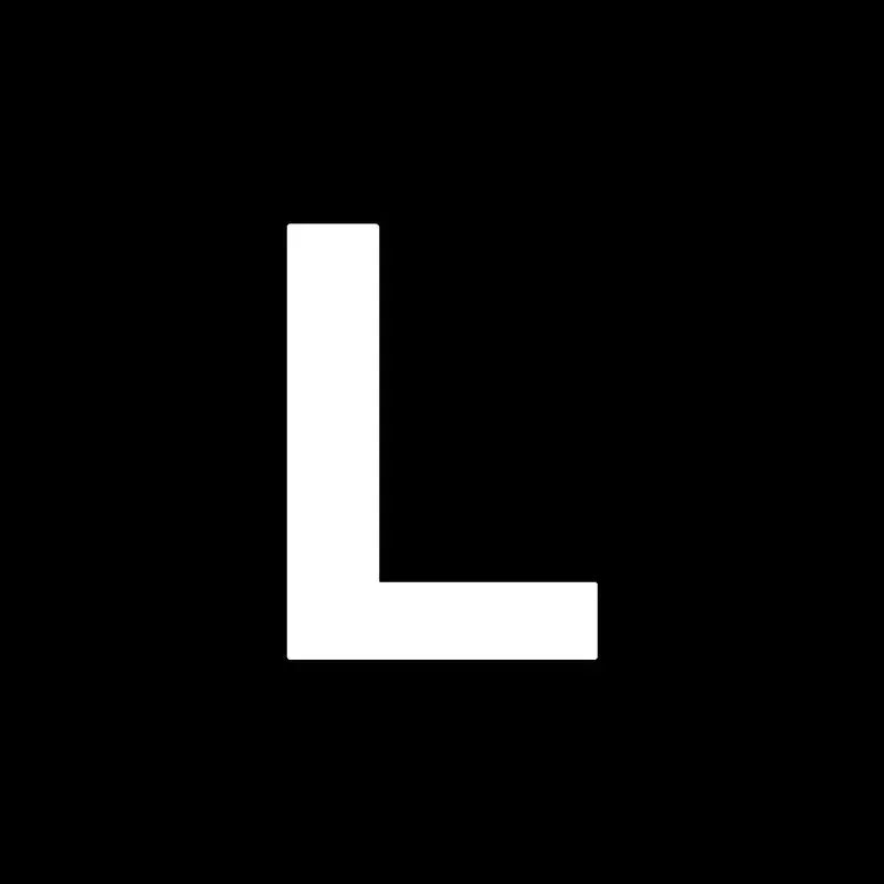 White capital letter l on black background symbolizing decorbites heart cake mold for kitchen baking and decorating use