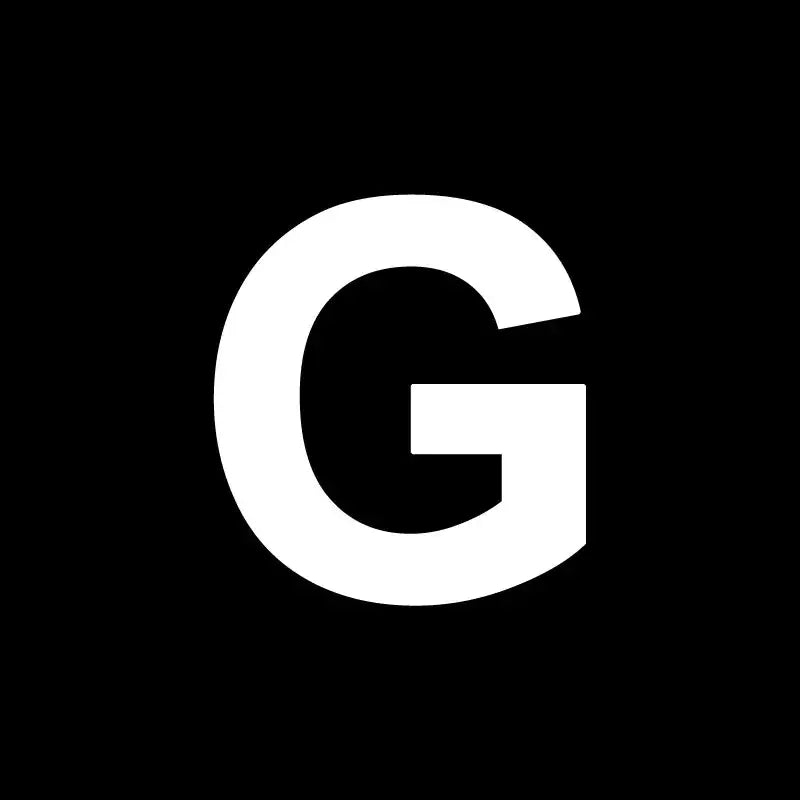 White capital letter g on black background for decorbites heart cake mold used in kitchen baking and decorating