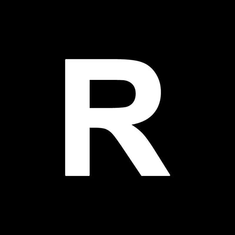White capital letter R on a black background for decorbites heart cake mold used in kitchen baking and decorating
