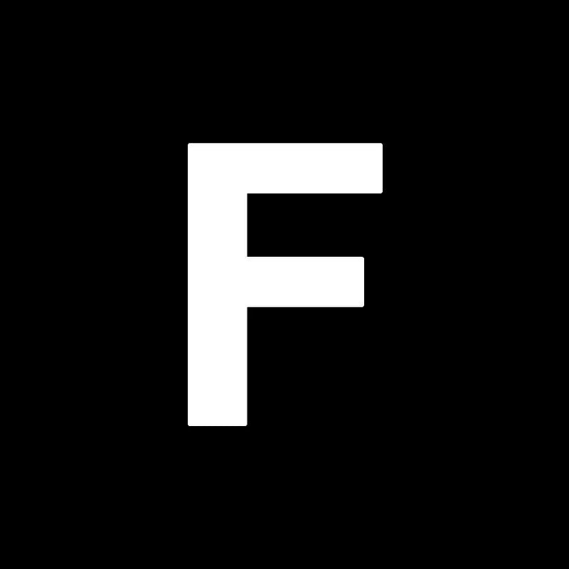 White uppercase letter f on black background for decorbites heart cake mold used in kitchen baking and decorating