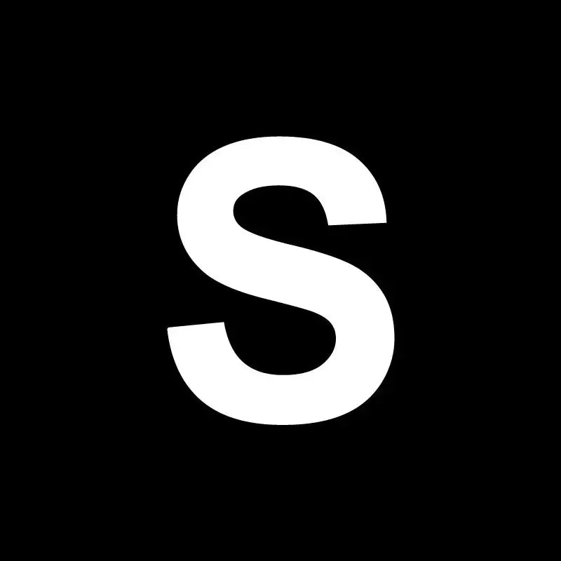 White uppercase letter s on black background for decorbites heart cake mold used in kitchen baking and decorating