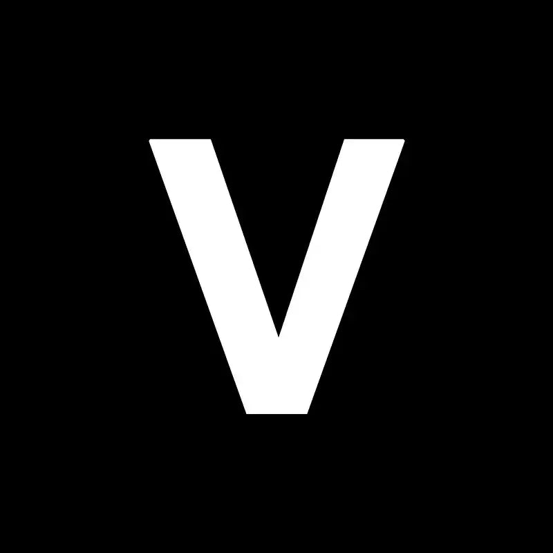 White uppercase letter v on black background representing decorbites heart cake mold for kitchen baking and cake mold use