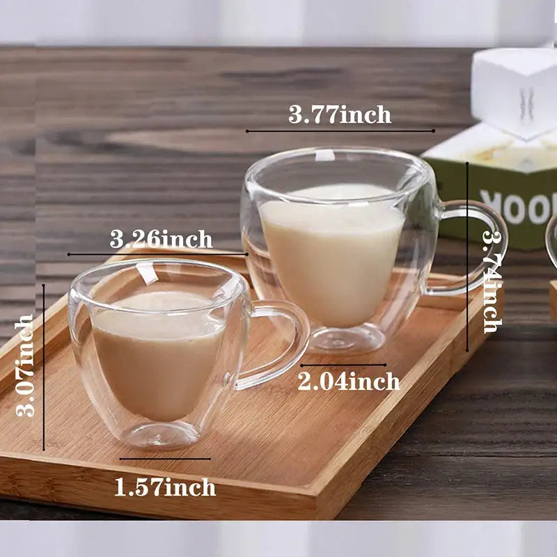 Heart love double walled clear glass coffee mug set with handles filled with creamy beverage for kitchen drinkware
