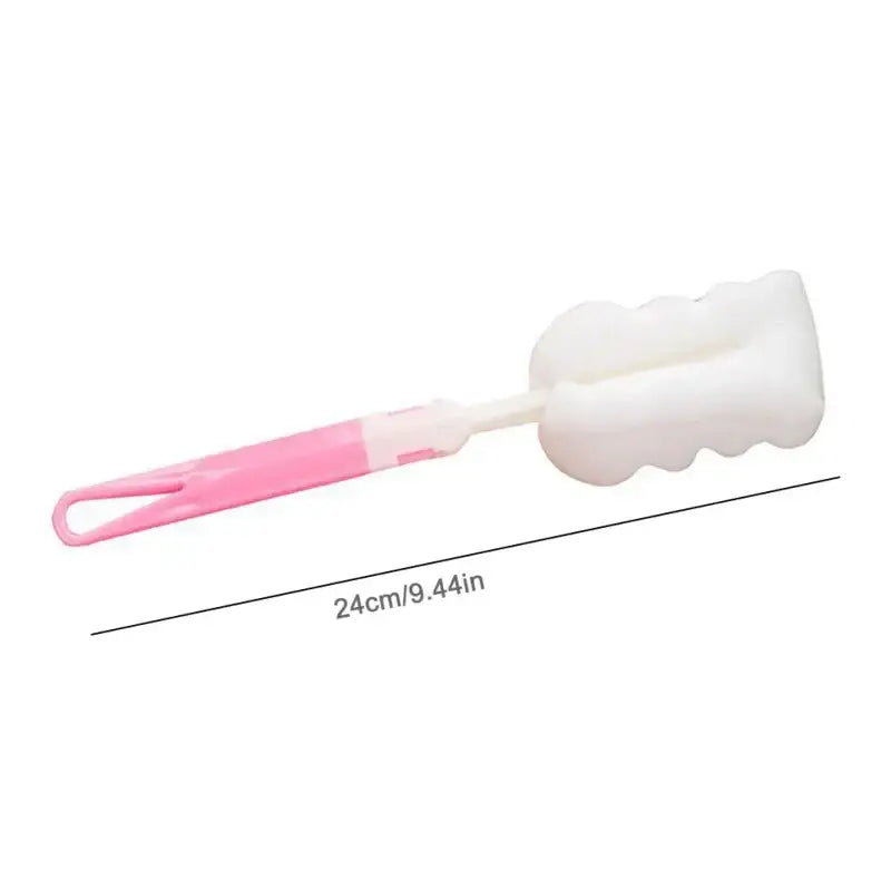Pink plastic handle bottle cleaner with white foam head for heat resistant glass espresso milk jug with wood handle