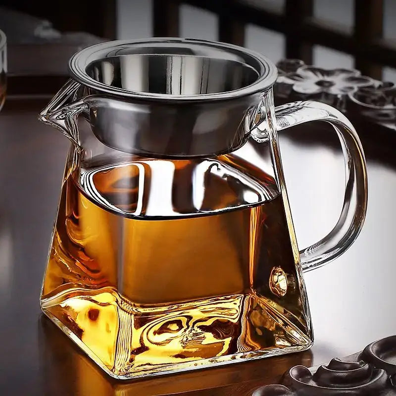 Clear glass heat resistant kung fu tea set fair cup with stainless steel infuser and amber tea inside