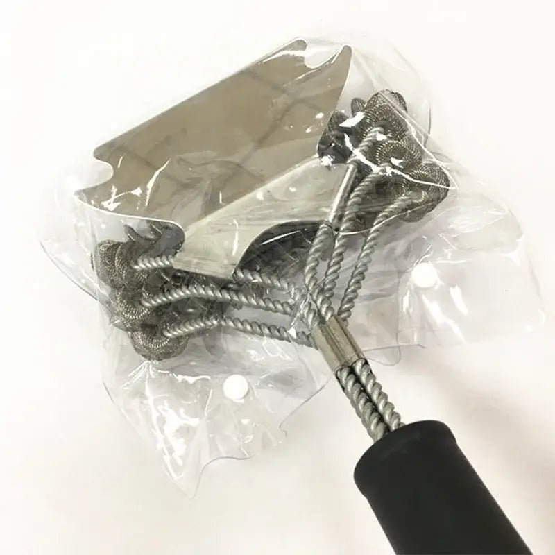 Silver stainless steel heavy duty bbq triple head brush with black rubber handle and twisted wire bristles for cleaning