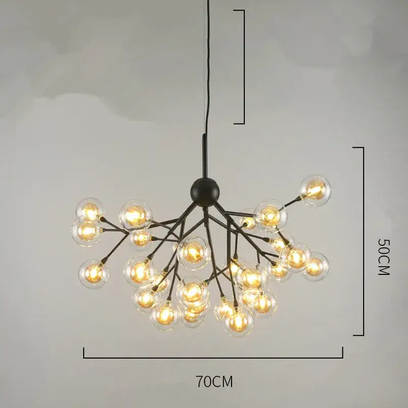 Black metal decorbites heracleum firefly chandelier with multiple clear glass globe bulbs emitting warm light for dining room decor