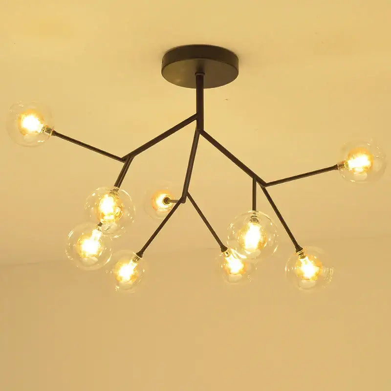 Black metal decorbites heracleum firefly chandelier with clear glass globe bulbs in branching design for dining room light