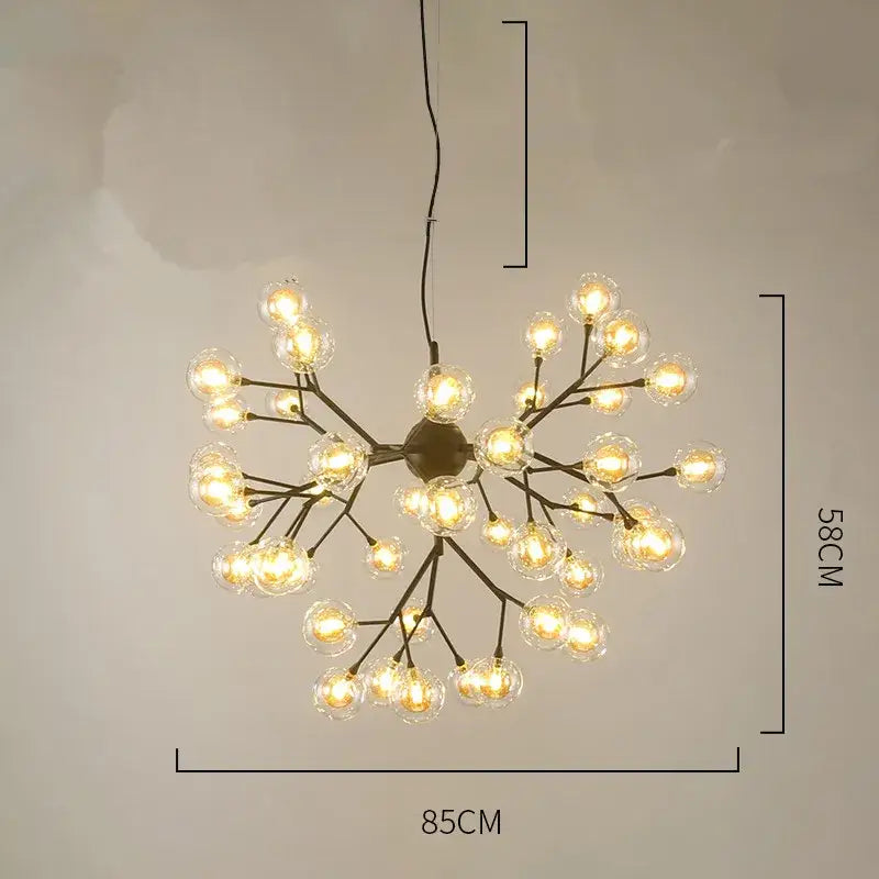 A modern black metal heracleum firefly chandelier with clear glass globe bulbs in a branching design for dining room decorbites heracleum firefly