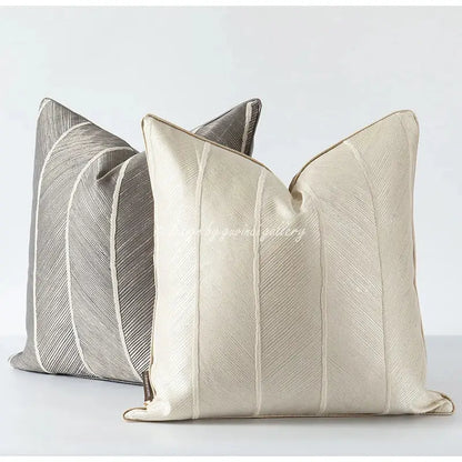 Cream-colored herringbone jacquard cushion cover with subtle diagonal ribbed texture and matching piping for living room decor