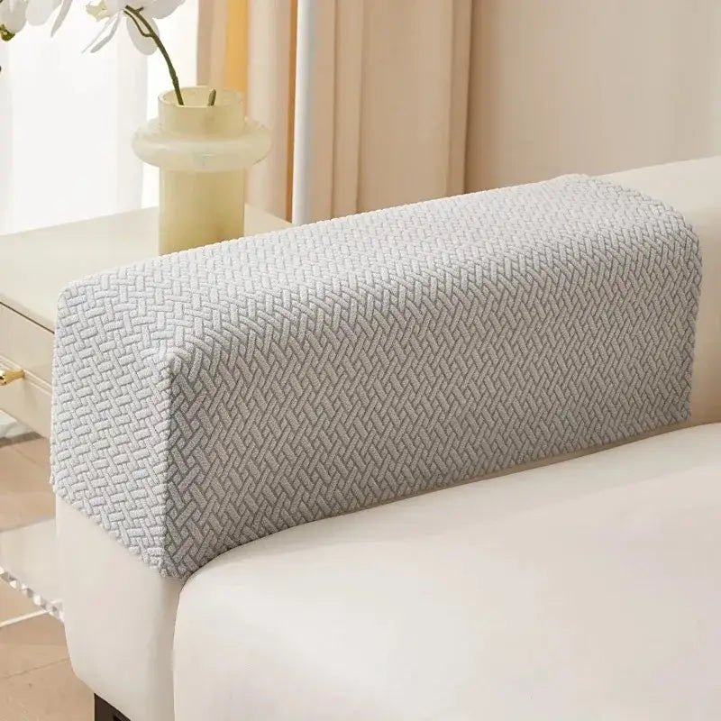 Light gray fleece herringbone weave sofa armrest cover with textured fabric for living room sofa protection