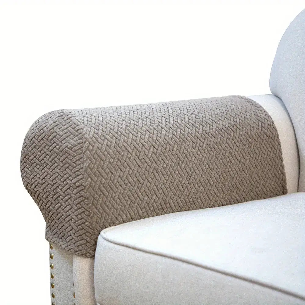 Beige fleece armrest cover with herringbone weave texture designed to protect living room sofa armrests