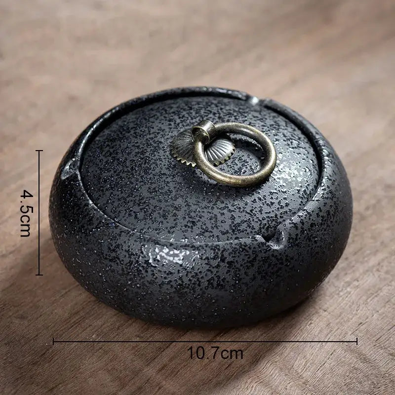 Hexagonal black pottery ashtray with brass ring handle and gold deer lid for living room by decorbites black pottery