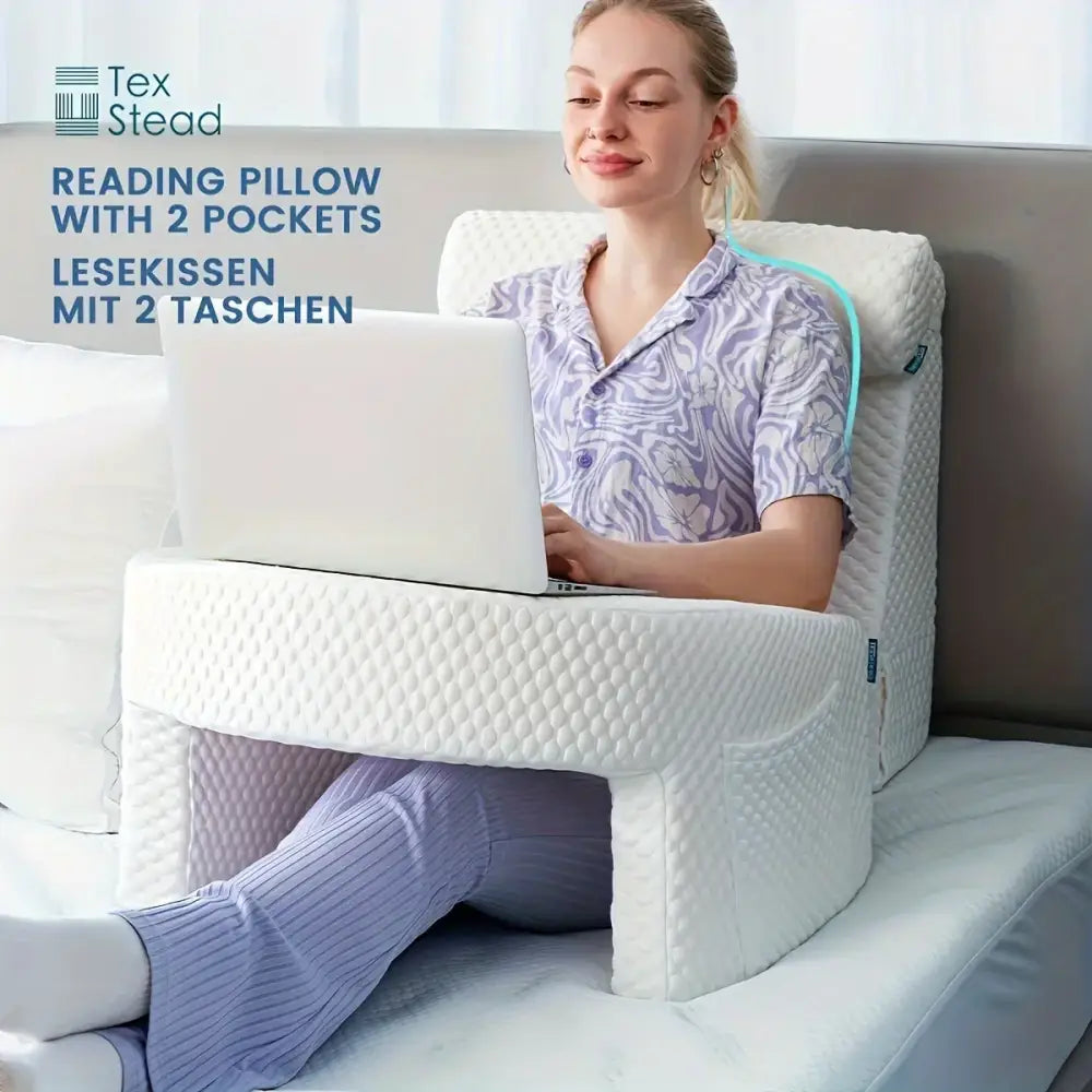 Hexagonal gray quilted gaming arm rest pillow with two side pockets for comfortable laptop use and gaming arm support