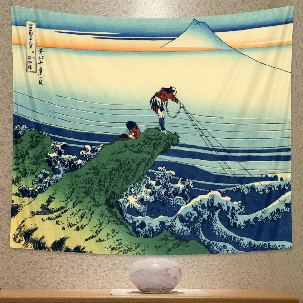 A vibrant red and blue fabric beach scenery tapestry featuring a classic japanese woodblock print of mount fuji and fishermen