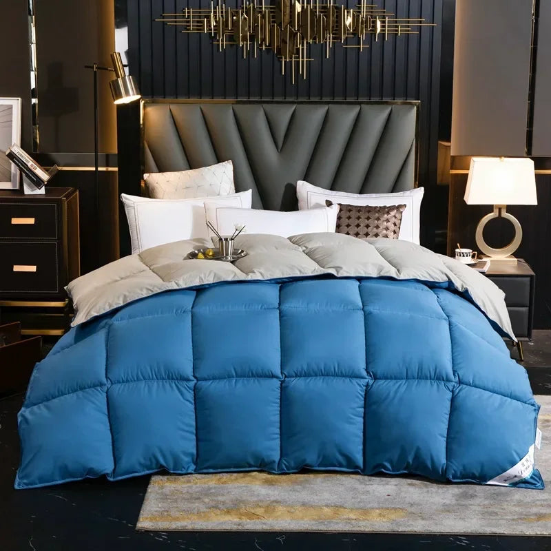 Blue quilted comforter with soft plush texture square stitching 100 percent cotton cover winter duvet blanket