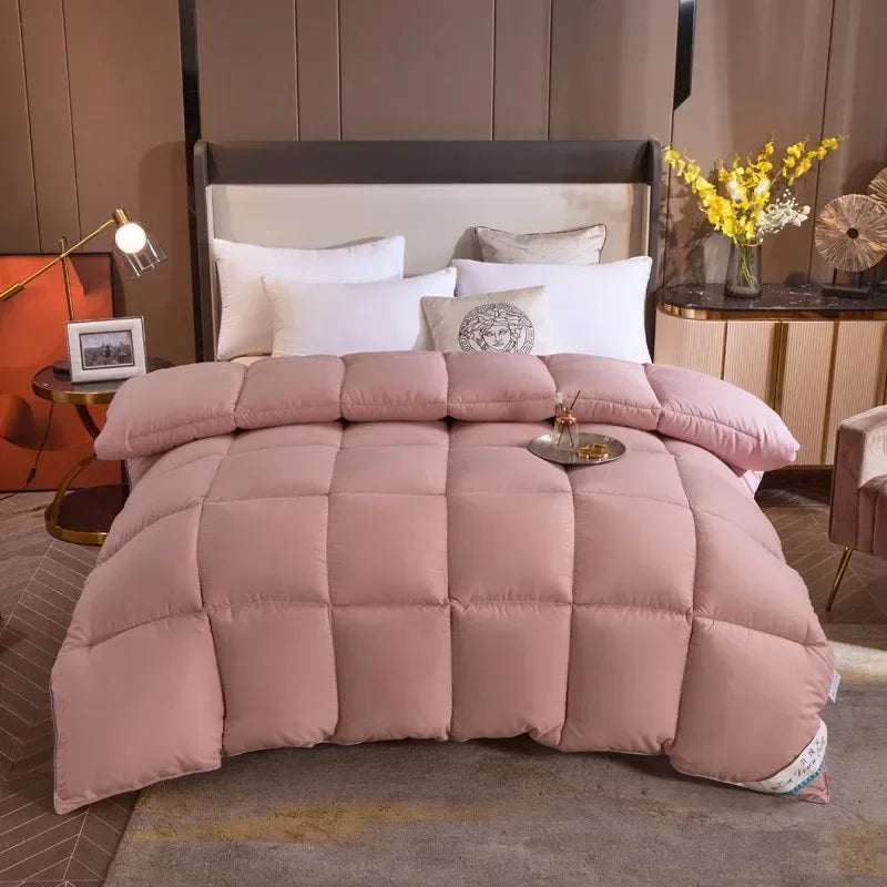 A plush dusty rose home comforter with square stitching 100 percent cotton cover goose down duvet quilt