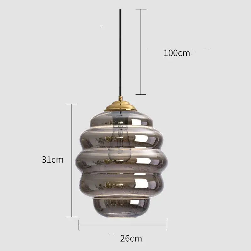 Honeycomb amber blue and gray glass pendant light with tiered smoked glass and brass accents for kitchen dining decorbites colorful glass