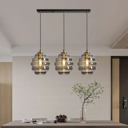 Honeycomb amber blue and gray glass pendant light with three-tiered smoked glass and brass accents for kitchen decorbites colorful glass ball pendant light