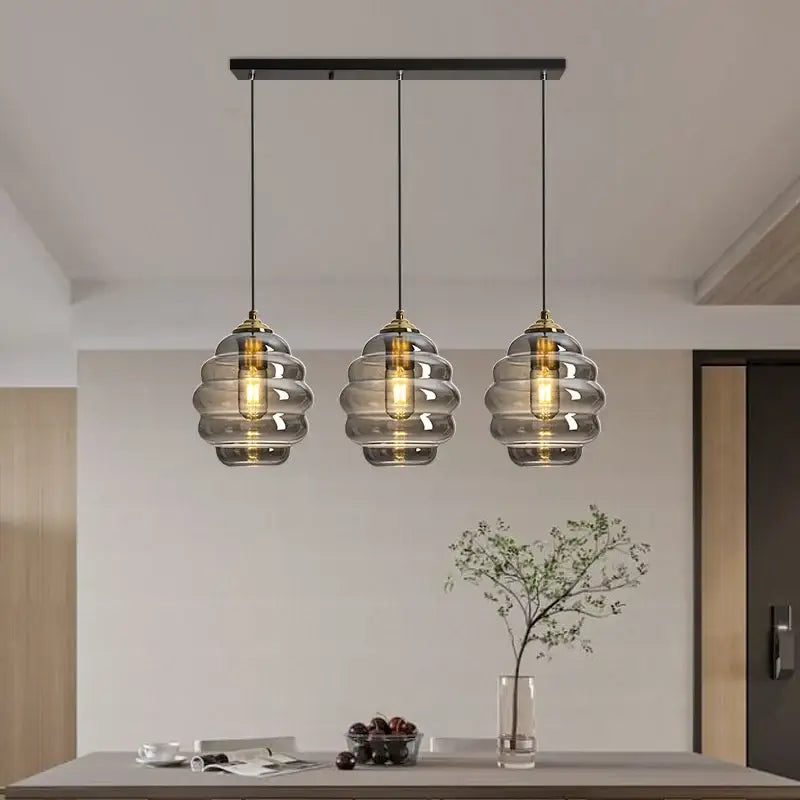 Honeycomb amber blue and gray glass pendant light with three-tiered smoked glass and brass accents for kitchen decorbites colorful glass ball pendant light